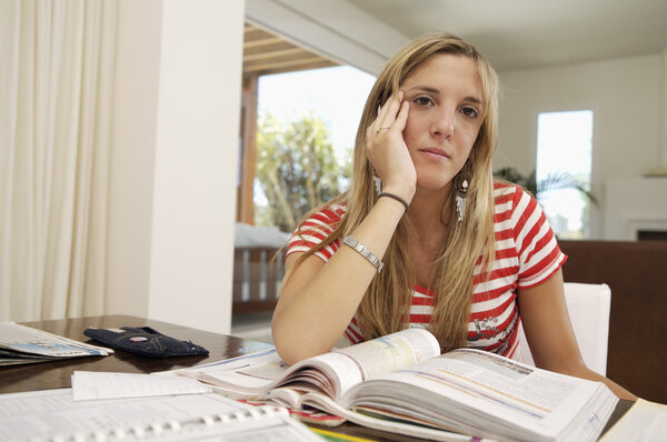 Teenage student doing homework
