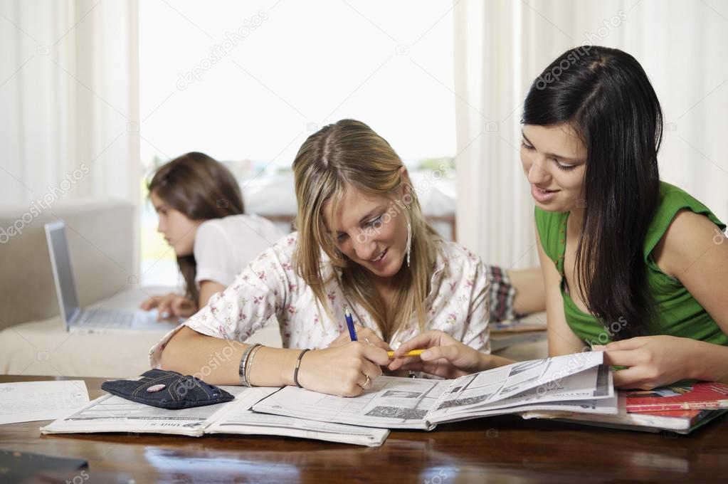 Teenage students doing homework