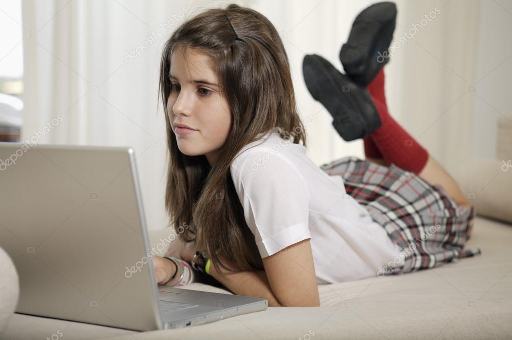 depositphotos_93702434-stock-photo-teenager-studying-with-laptop.jpg
