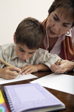 Grandmother and grandson drawing clipart