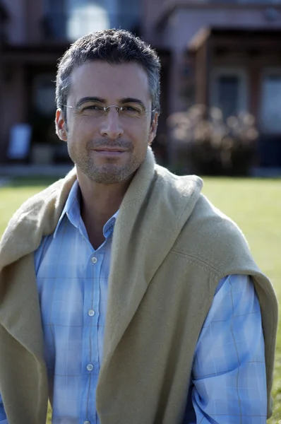 Man in eyeglasses and sweater — Stock Photo, Image