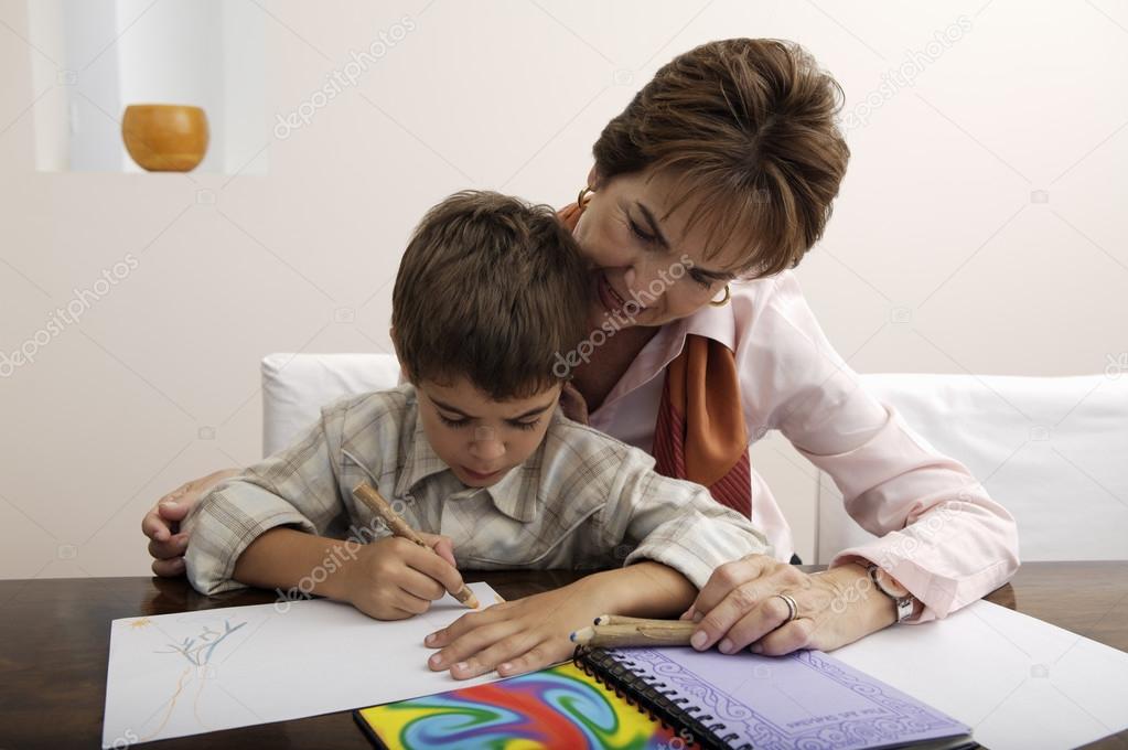 Grandmother and grandson drawing