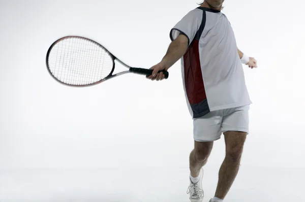 Теннисист с ракетом — стоковое фото
