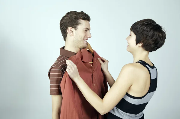 couple choosing shirt