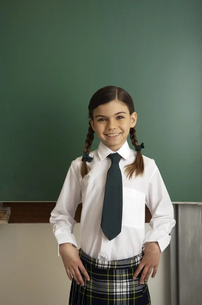 Little girl at school classroom — Stock Photo, Image