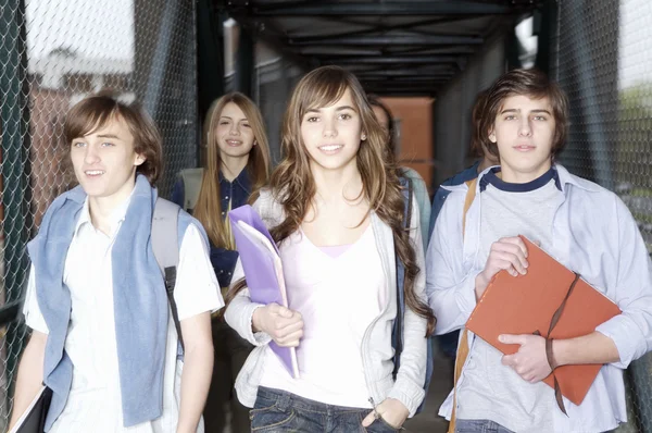 Teenage students walking together — Stock Photo, Image