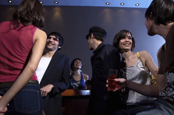 Group of people in bar — Stock Photo, Image