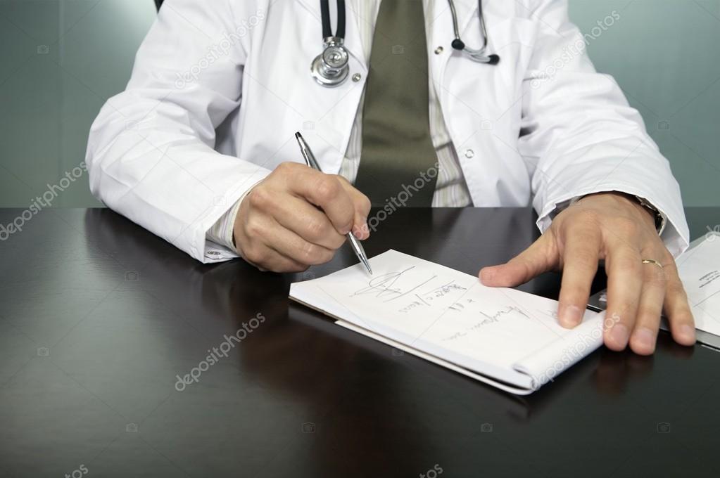 doctor writing prescription