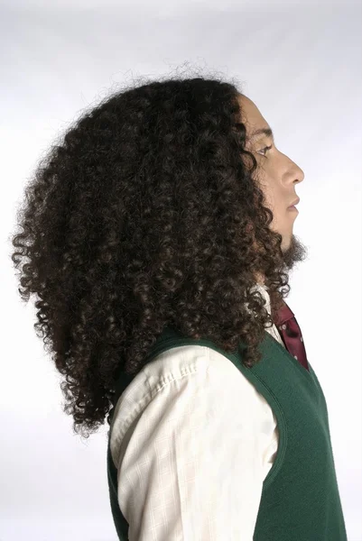 Young man with long curly hair — Stock Photo, Image