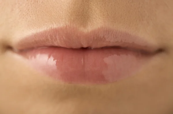 Female mouth with clear lipgloss — Stock Photo, Image