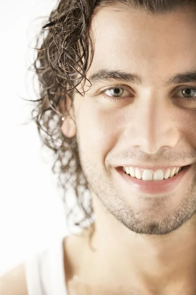 Handsome curly young man Stock Image