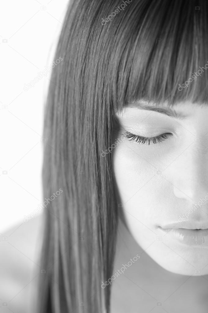 woman with straight hair and bangs