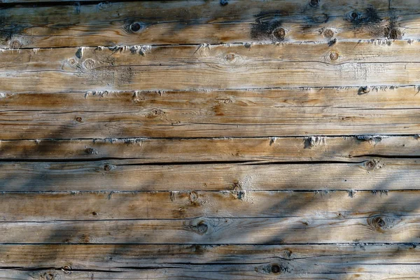De houten muur van oude huis. — Stockfoto