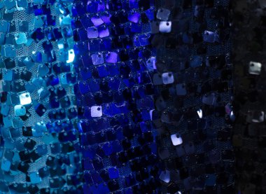 Mavi ve altın kumaşlar pullardan yapılır. Mavi gradyan. Ayırt edici bir dokusu ve parlaklığı olan Art Deco arkaplanı