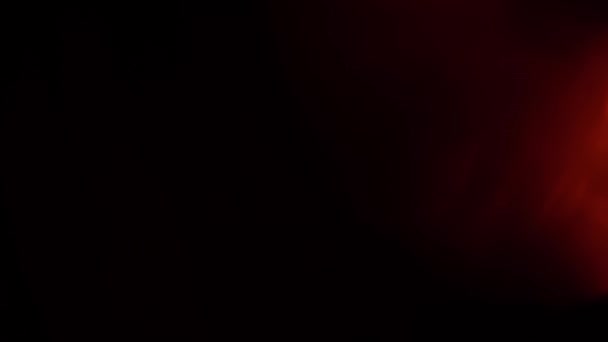 Lente roja resplandor llamarada superposiciones bokeh, quemar fondo de llama. Light Red Flares 4K material de archivo Para componer sobre su material de archivo, estilizar vídeo, transiciones. Lámpara desenfocada efecto de rayos de flash. Pulsos de luz — Vídeo de stock