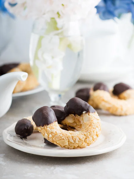 Almond crescent cookies with chocolate — Stock Photo, Image