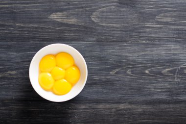 Egg yolks in a bowl clipart
