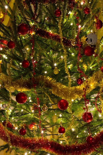 Baubles hanging on christmas tree — Stock Photo, Image