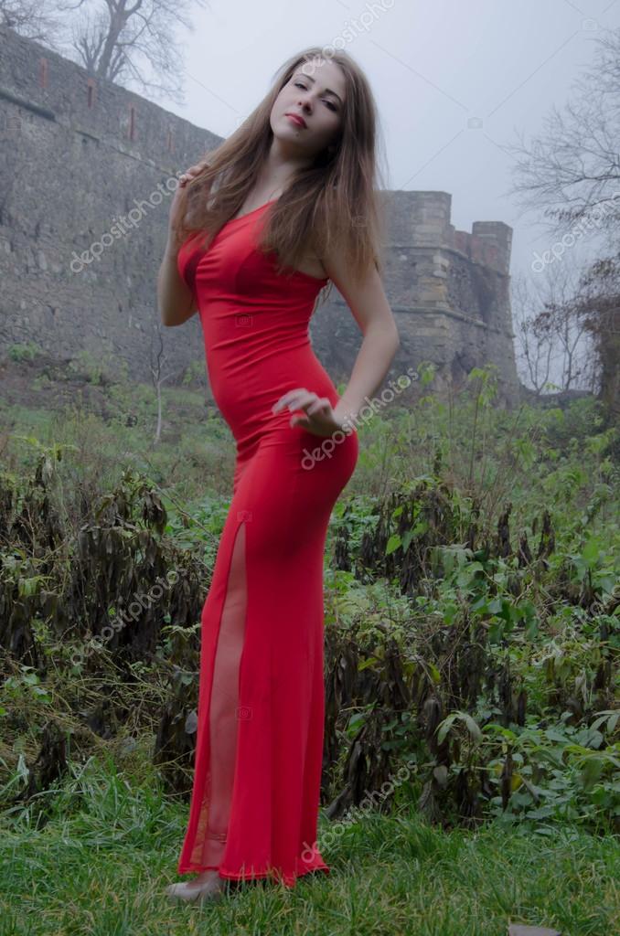 Sexy woman wearing red dress — Stock Photo © levrints01 #92532078