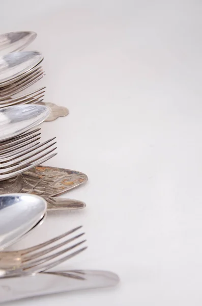 Cuchillo y tenedor aislados sobre fondo blanco — Foto de Stock