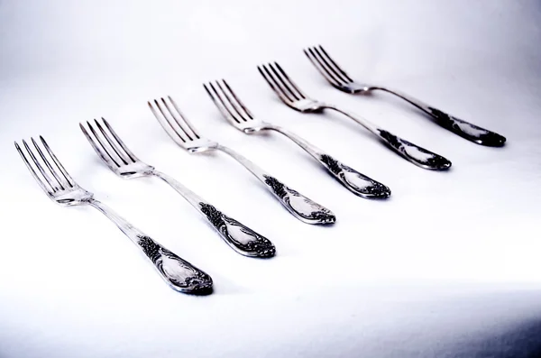 Old cutlery on wooden table — Stock Photo, Image