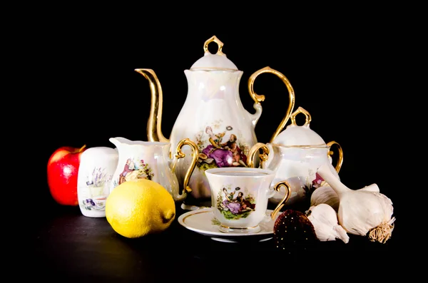 Vintage porcelain tea set on a white background — Stock Photo, Image