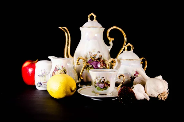 Vintage porcelain tea set on a white background — Stock Photo, Image