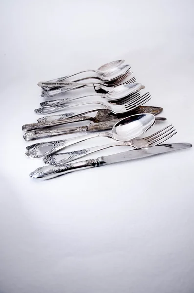 Colher de garfo e faca isolada no fundo branco — Fotografia de Stock