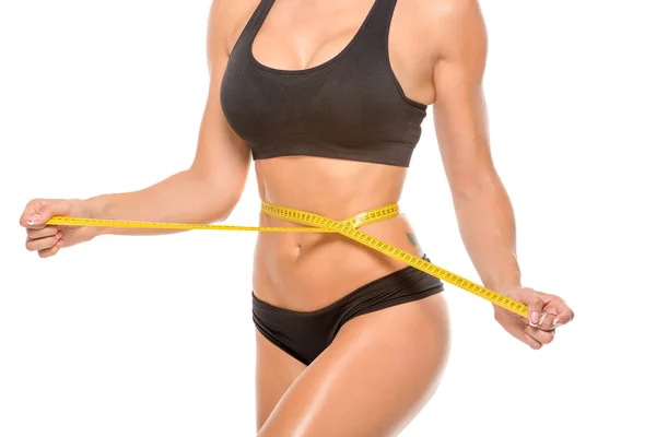 Beyaz arka plan üzerinde güzel fitness modeli