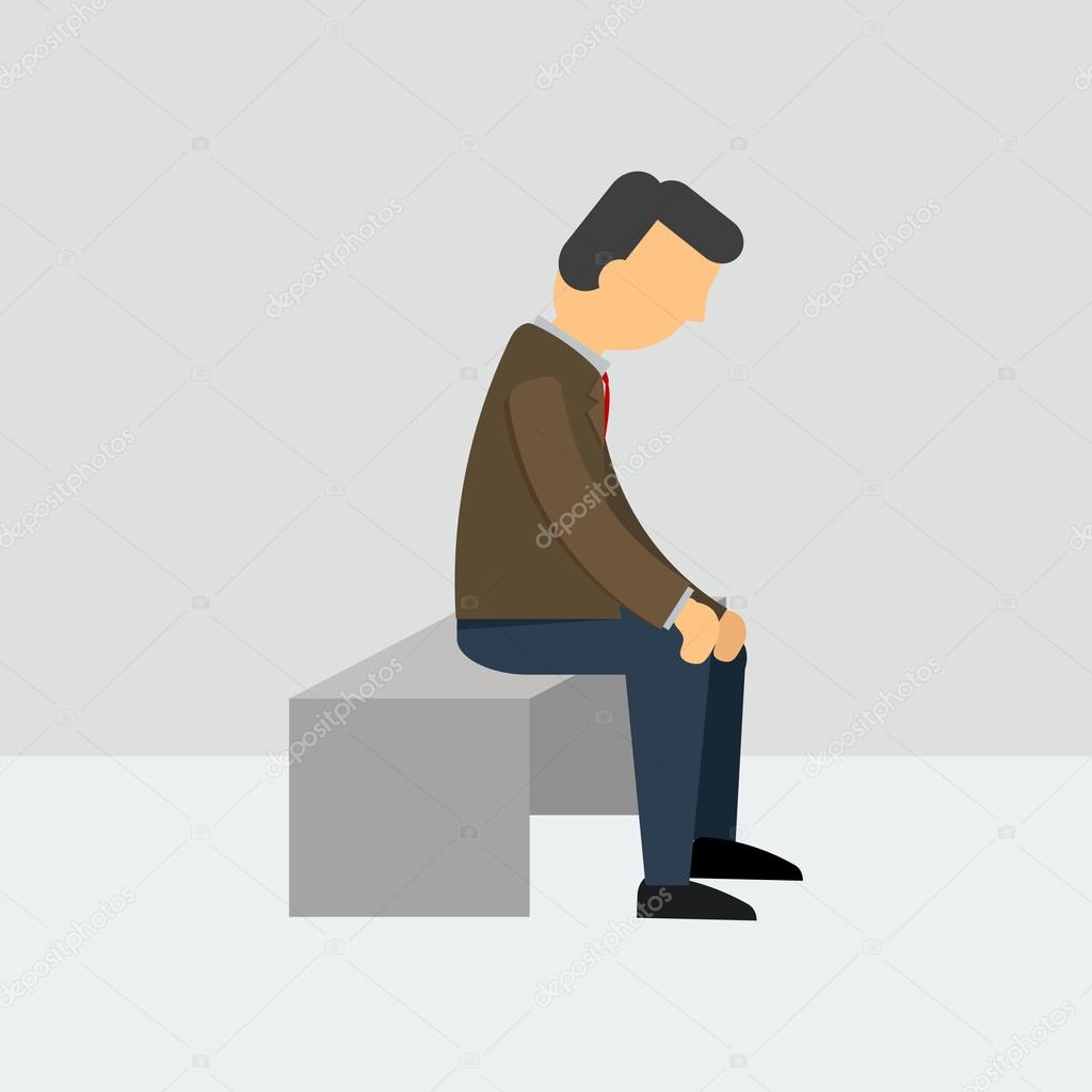 Depressed man sitting on a bench