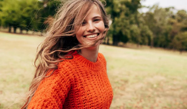 Positive Young Woman Wearing Knitted Orange Sweater Posing Nature Background — Stock Photo, Image