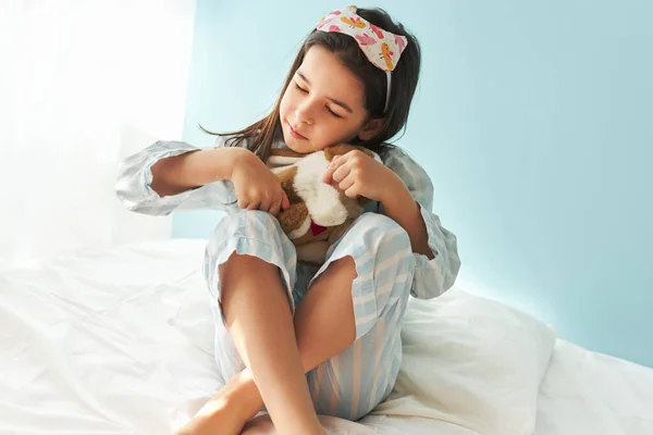 Playful Little Girl Pajama Playing Toy Bed Modern Cozy Sunny — Stock Photo, Image