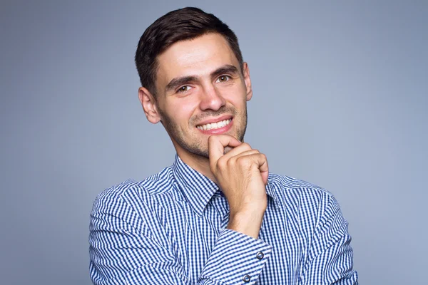 Gelukkig lachend zakenman, geïsoleerd over grijze achtergrond — Stockfoto