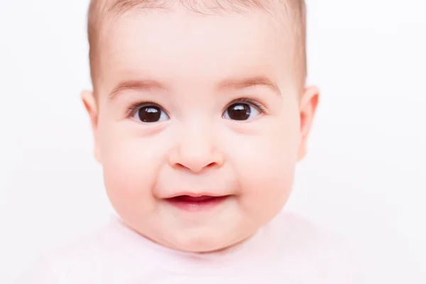 Close-up portait de bebê bonito surpreso no branco — Fotografia de Stock