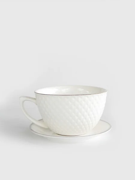 Vazio copo de café branco no fundo branco — Fotografia de Stock