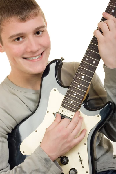 The young man with a guitar — Stock Photo, Image