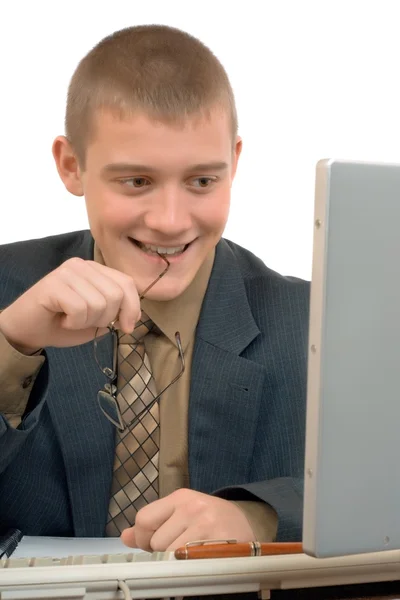 Smiling young businessman in a suit and tie — Stock Photo, Image