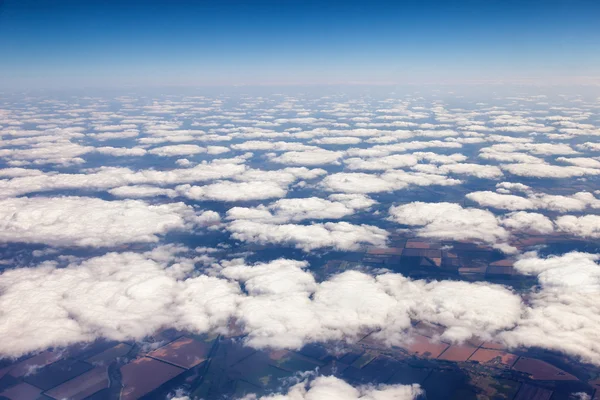 On the ground View from behind the clouds