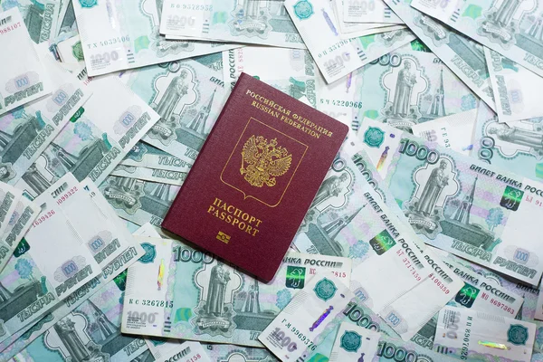 Passport on the background of the Russian currency