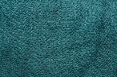 Bu deniz mavisi kumaşı, çeşitli tasarım projeleri ve arka planlar için ideal bir dokuma dokusuna sahiptir.