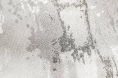 Bu resim, çeşitli yaratıcı projeler için ideal, eşsiz, sanatsal bir tasarıma sahip bir kumaşın yakın çekimini içerir.