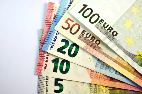Verschillende close-up Euro bankbiljet en munt — Stockfoto