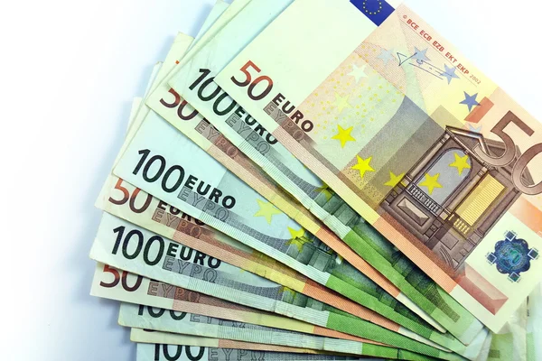 Verschillende close-up Euro bankbiljet en munt — Stockfoto