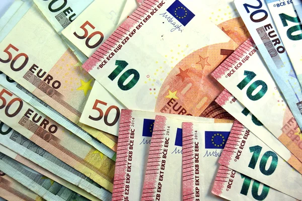 Olika nära upp euron sedel och valuta — Stockfoto