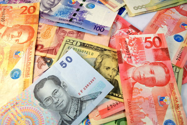 Close up of  Various currency notes and coins from different countries