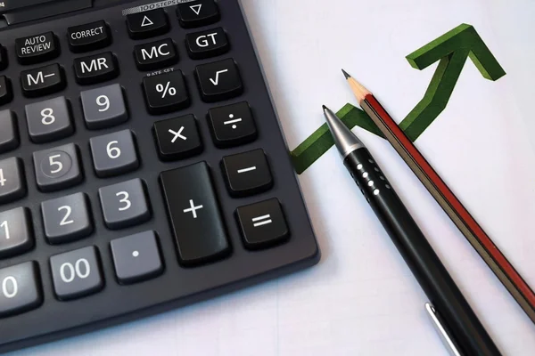 Eye Glasses, pen and pencil over the Formula with calculator — Stock Photo, Image