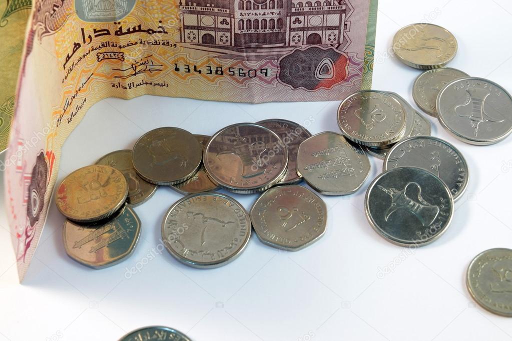 Close up of  Various currency notes and coins from United Arab Emirates