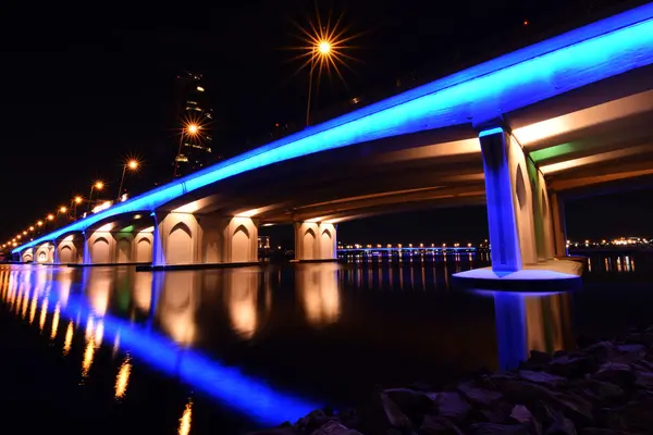 Business Bay Bridge and walk at night with long exposure, Dubai, UAE — Stock Photo, Image