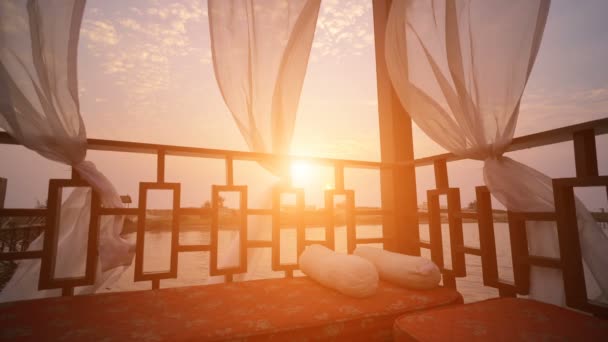 Gazebo with sea view, sunset falling over the beach — Stock Video