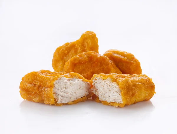 Fried chicken nuggets isolated on white — Stock Photo, Image